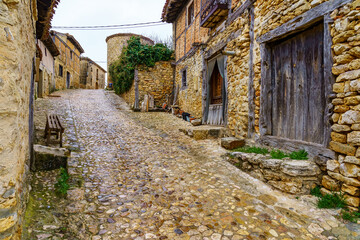 Picturesque view of old village alley in Calatanazor, Soria.