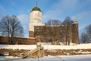 At the ancient Vyborg castle on a February afternoon. Leningrad region, Russia