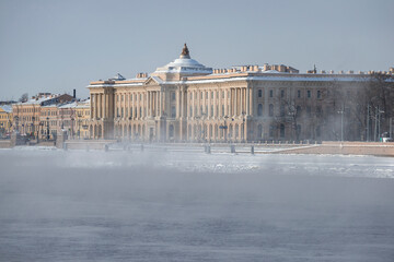 View of the building of the St. Petersburg Academy of Arts named after Ilya Repin across the winter...