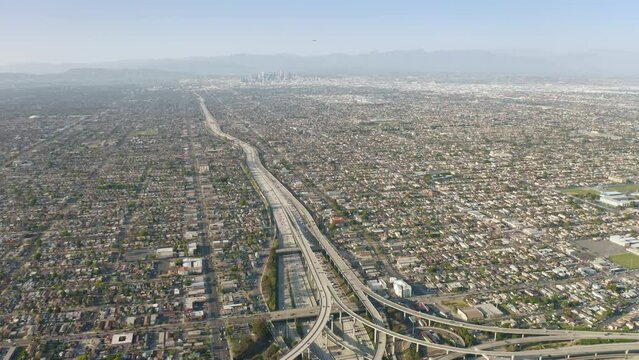 Aerial view from above of cars and trucks traveling in congested road traffic 4K