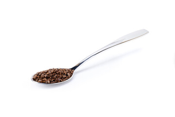 Granulated coffee powder in metal teaspoon isolated on white background. Clipping path.