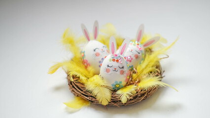 banner. Easter eggs in the form of hares on a white background. Flat styling. Copy the place for the text.