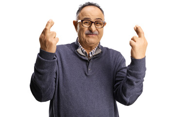 Naklejka premium Mature man gesturing a good luck sign