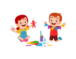 little kid cut paper for art with friend