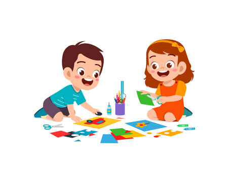 little kid cut paper for art with friend