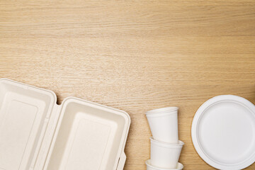 Eco friendly concept, Food container set and paper cup of biodegradable on wooden background