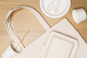 Eco friendly concept, Eco bag with food container on wooden background