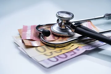 Fotobehang Health Care Money And Illness © Andrey Popov