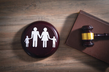 Paper cut family, judge gavel and book. Family Law