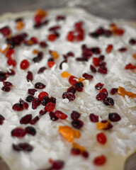 raisins close up on dough. Baking. Kraffin