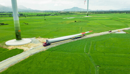 Oversize Load - A turbine blade for a wind turbine being transported to the construction site to...
