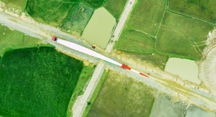 Oversize Load - A turbine blade for a wind turbine being transported to the construction site to...
