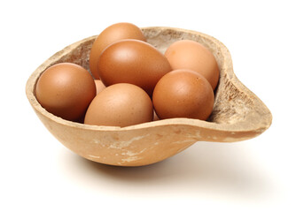 brown eggs on white background