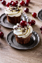 cupcakes with fresh cherry.