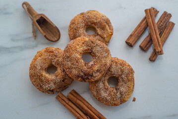 sweet home made cinnamon donuts on a table