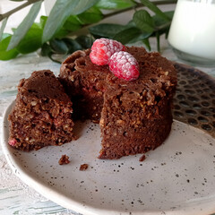 Chocolate cake on the handmade plate