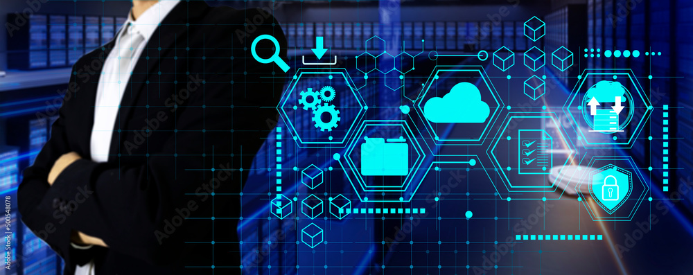 Poster a businessman builds a large server room for cloud support.,uses computer equipment for transmitting