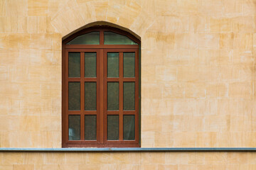 One window on the facade of the modern urban apartment building front view, Krasnaya Polyana, Sochi, Krasnodar Krai, Russia
