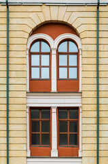 Several windows in a row on the facade of the modern urban apartment building front view, Krasnaya Polyana, Sochi, Krasnodar Krai, Russia
