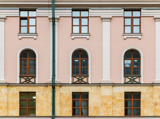 Several windows in a row on the facade of the modern urban apartment building front view, Krasnaya...