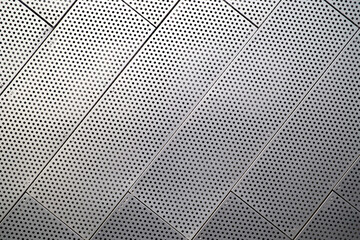 Perforated metal panel texture and pattern