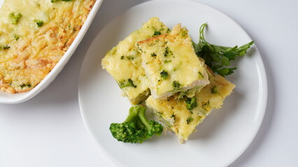Casserole with cheese and broccoli. Broccoli gratin with melted cheese