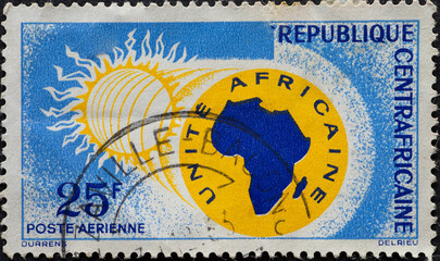 Republic of Central Africa  - circa 1963: a postage stamp from CRepublic of Central Africa , showing a sun and the outline of the continent of Africa. Airmail-African Unity