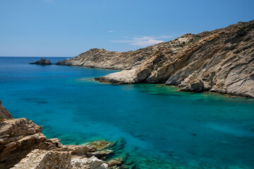 Panoramic view of the stunning turquoise beach of Tripiti in Ios Greece