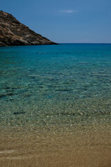 Fototapeta premium View of the most amazing turquoise beach of Tripiti, on a beautiful day on the island of Ios Greece