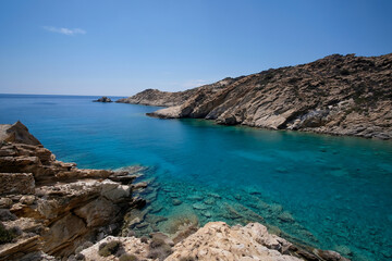 Panoramic view of the stunning turquoise beach of Tripiti in Ios Greece