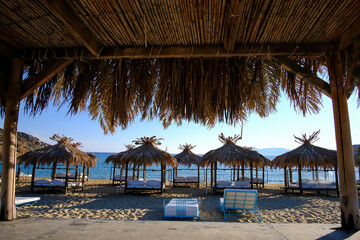 Luxury sunbeds at the famous beach of Mylopotas in Ios Greece