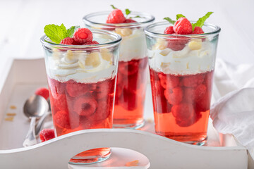 Tasty red jelly made of cream and fruits.