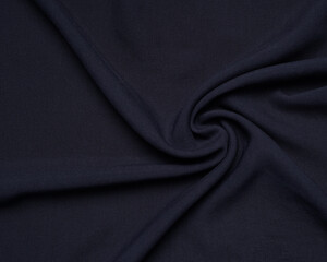 Fototapeta premium The texture of the hijab fabric when shaped like waves. Looks beautiful looks like a flower painting. Fashion needs in the month of Ramadan before Eid. focus blur. women's hijab. women's cloth mock-up