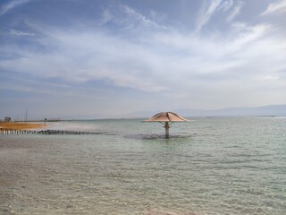 beach with umbrella sea nature travel tourism summer day 