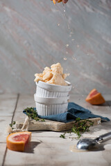 Home made grapefruit sorbet ice cream with thyme and juice splash