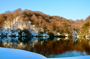 Sunset and empty snowy mountains