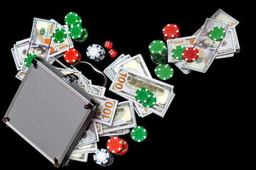Gambling Briefcase Full of Money Cash, jackpot, casino chips. Suitcase with dollars, poker chips. Metal cash box Container stuffed with Paper currency, Casino tokens, gaming chips, checks, or cheques