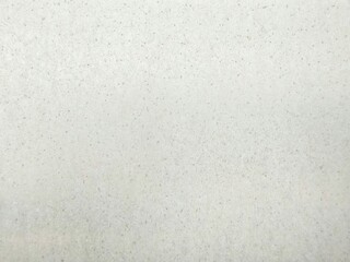 The light reflects off the stainless steel sheet as the background.