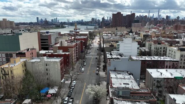 aerial moving forward low over East Harlem in NYC