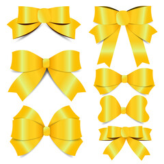 Golden bow set on white background