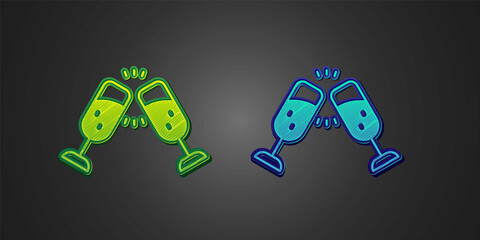Green and blue Glass of champagne icon isolated on black background. Merry Christmas and Happy New Year. Vector