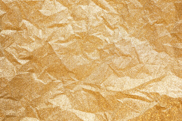 シワのあるゴールドラメのテクスチャ