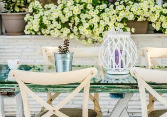 Chairs in the garden restaurant in Leptokarya, Greece.