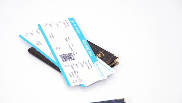 Passports, plane tickets and money appear on white background. Stop motion animation.
