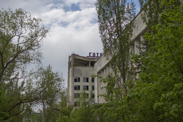 Chernobyl, Ukraine - May 11, 2019: Pripyat City Council and Polissya Hotel - Pripyat, Chernobyl Exclusion Zone