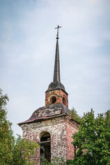 the bell tower of an abandoned Orthodox church