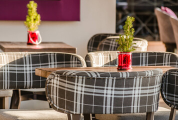 Chairs in the garden restaurant in Leptokarya, Greece.