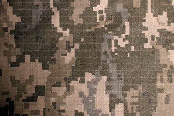 Ukrainian military uniform fabric. Pixel military uniform. Military camouflage fabric background - obrazy, fototapety, plakaty