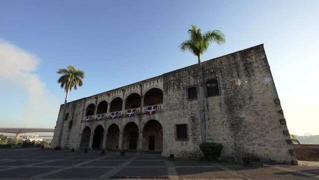 Slow motion Alcazar de Colon early morning. Plaza de la Hispanidad or Spain at sunrise with no people. Colonial zone of Santo Domingo, Dominican Republic. 