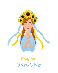 Beautiful ukrainian woman in a wreath with sunflowers prays for Ukraine. Stop war.
